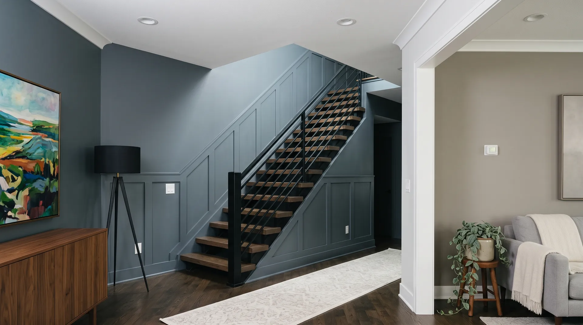 Slate Tile SW 7624 in a moody, contemporary foyer